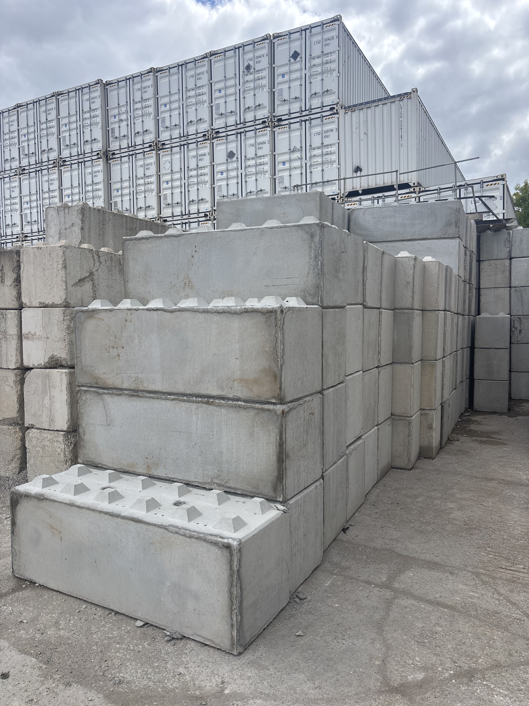 Stacked interlocking concrete blocks ready for delivery